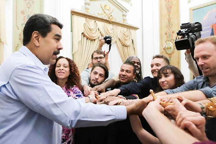 Maduro con los activistas estadounidenses