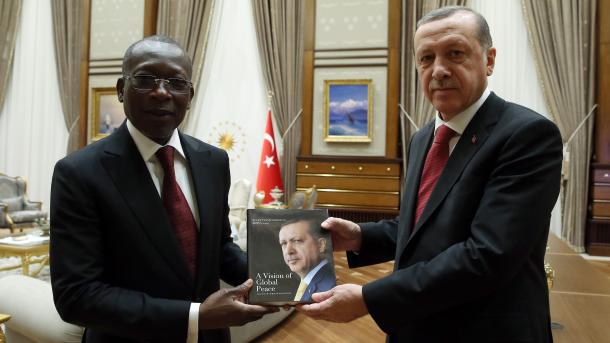 Patrice Tallon y Recep Erdogan