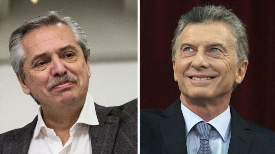 El presidente saliente argentino Mauricio Macri y el presidente electo Alberto Fernández