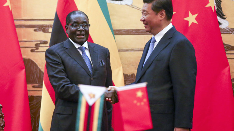 Presidente Robert Mugabe y su contraparte china Xi Jinping